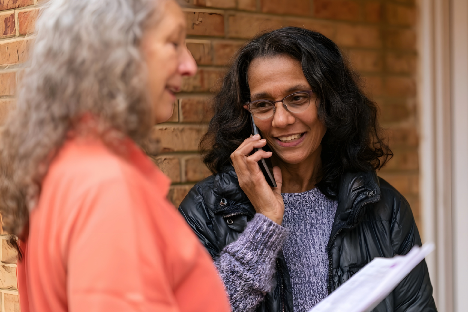 two woman chatting